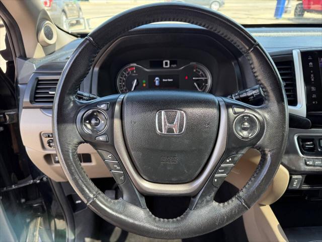 Photo of 2018 Black Forest Pearl Honda Pilot