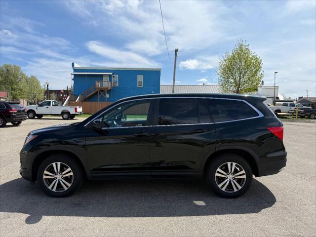 Photo of 2018 Black Forest Pearl Honda Pilot