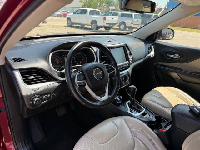 Photo of 2017 Deep Cherry Red Crystal Pearlcoat Jeep Cherokee