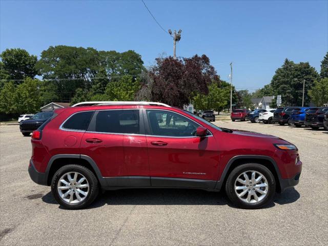 Photo of 2017 Deep Cherry Red Crystal Pearlcoat Jeep Cherokee