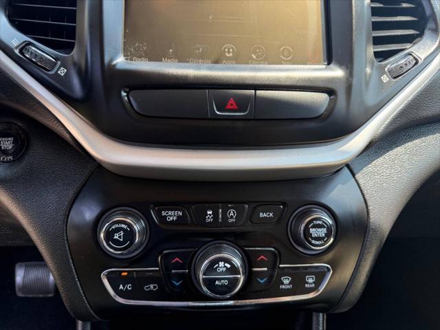 Photo of 2017 Deep Cherry Red Crystal Pearlcoat Jeep Cherokee
