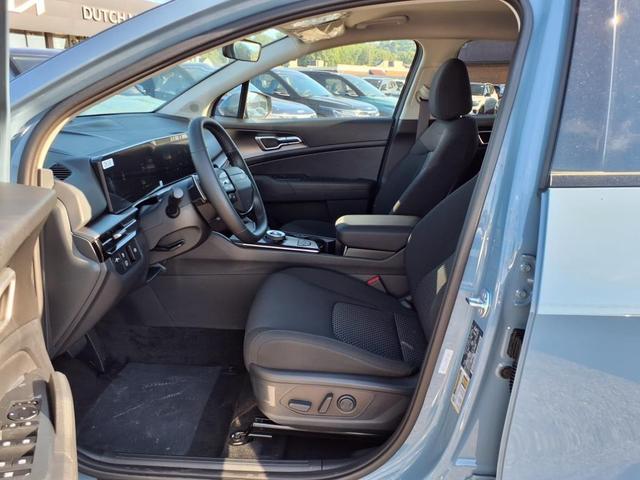 Photo of 2026 Heritage Blue Kia Sportage