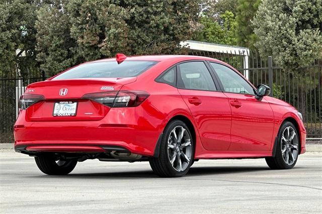 Photo of 2025 Rallye Red Honda Civic Hybrid
