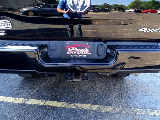 Photo of 2023 Diamond Black Crystal Pearlcoat RAM 2500