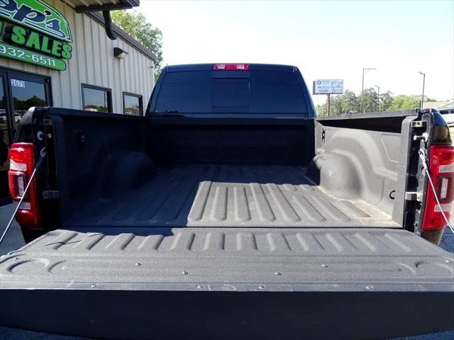 Photo of 2023 Diamond Black Crystal Pearlcoat RAM 2500
