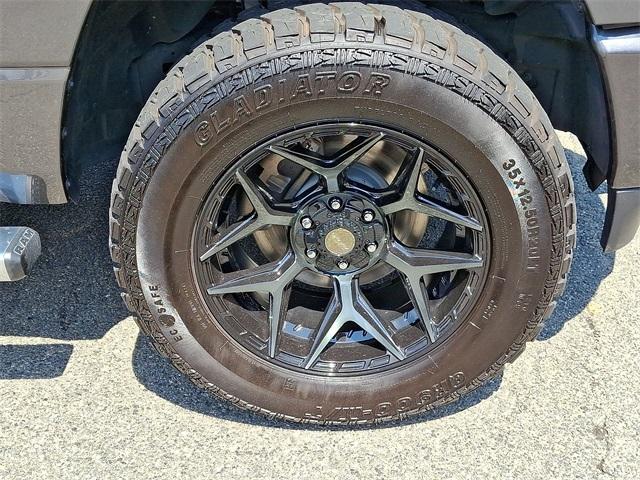 Photo of 2024 Granite Crystal Clearcoat Metallic RAM 1500