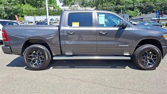 Photo of 2024 Granite Crystal Clearcoat Metallic RAM 1500