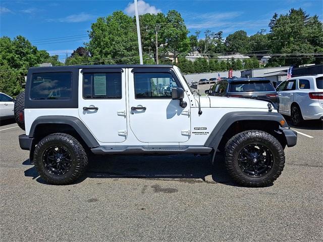 Photo of 2016 Bright White Clearcoat Jeep Wrangler Unlimited