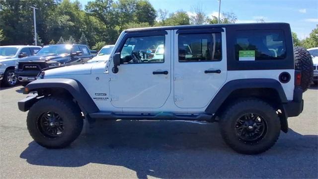 Photo of 2016 Bright White Clearcoat Jeep Wrangler Unlimited