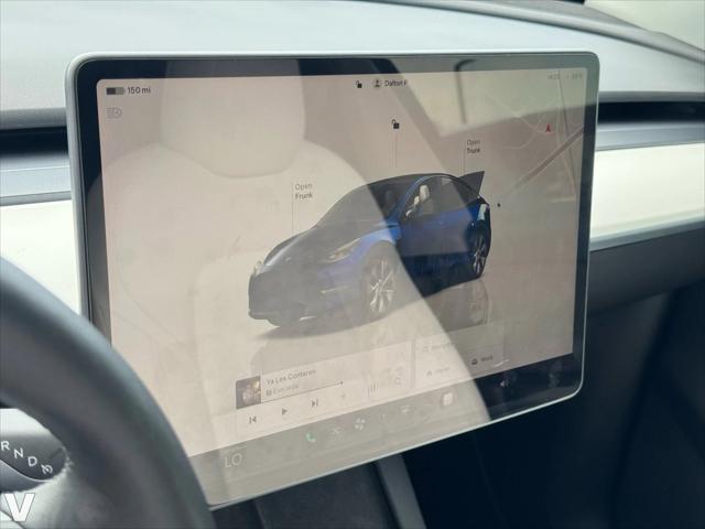 Photo of 2022 Deep Blue Metallic Tesla Model Y