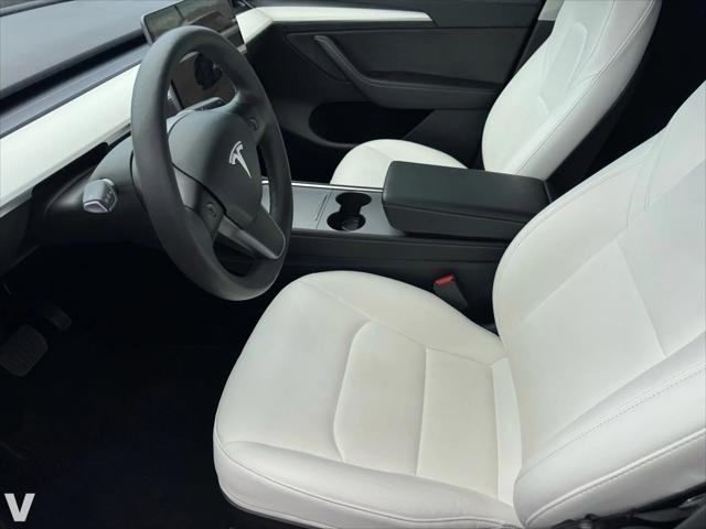 Photo of 2022 Deep Blue Metallic Tesla Model Y
