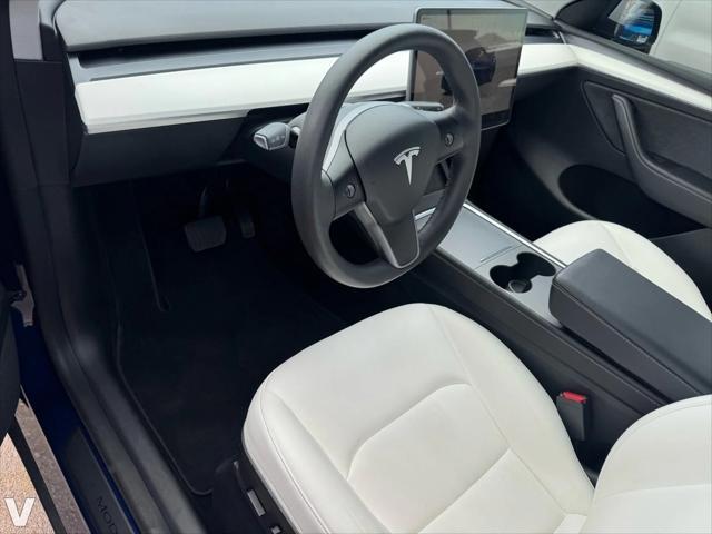 Photo of 2022 Deep Blue Metallic Tesla Model Y