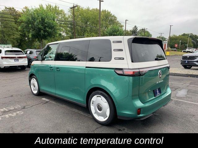 Photo of 2025 Mahi Green Metallic - Candy White Volkswagen ID. Buzz