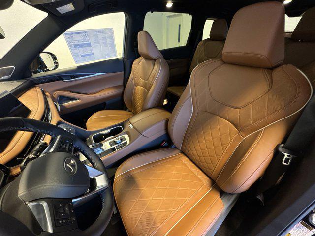 Photo of 2025 Grand Blue/Black Obsidian INFINITI QX60