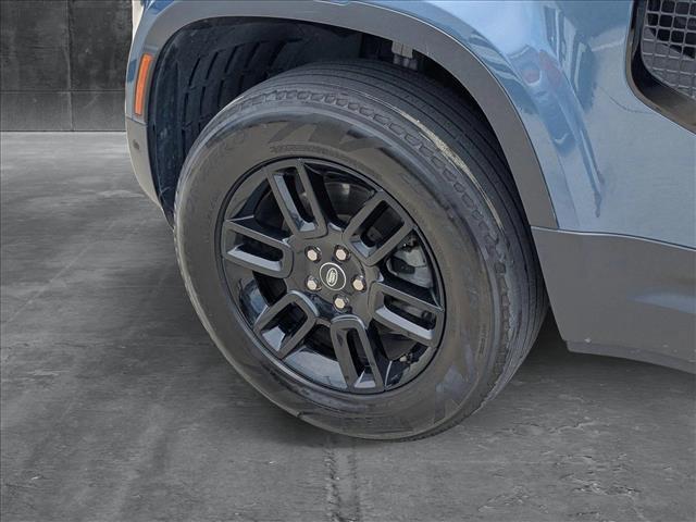 Photo of 2023 Tasman Blue Metallic Land Rover Defender