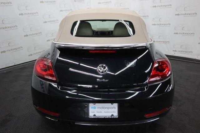 Photo of 2019 Deep Black Pearl w/ Beige Top Volkswagen Beetle