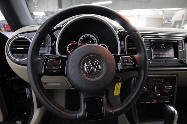 Photo of 2019 Deep Black Pearl w/ Beige Top Volkswagen Beetle