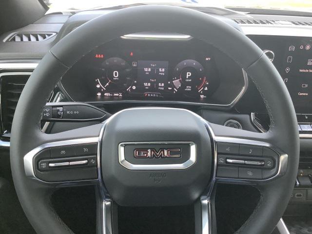 Photo of 2025 Deep Bronze Metallic GMC Canyon