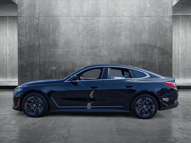 Photo of 2025 Black Sapphire Metallic BMW i4 Gran Coupe