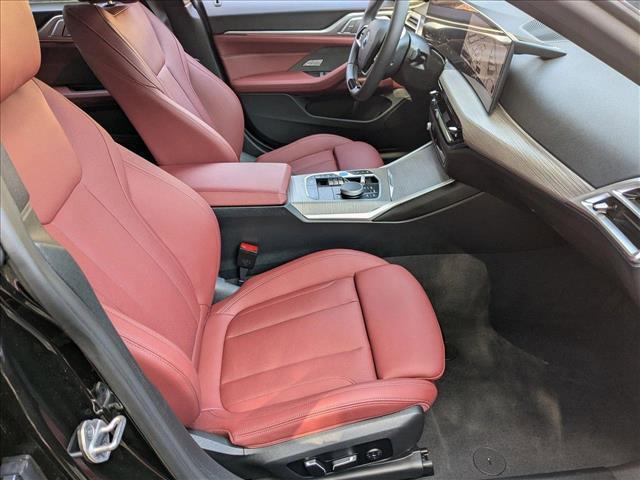 Photo of 2025 Black Sapphire Metallic BMW i4 Gran Coupe