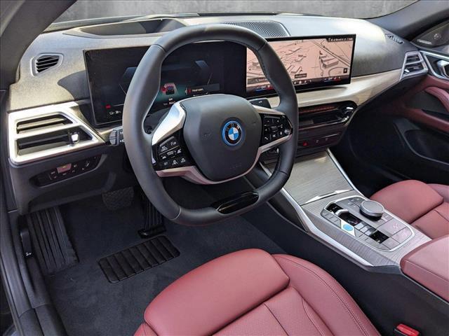 Photo of 2025 Black Sapphire Metallic BMW i4 Gran Coupe