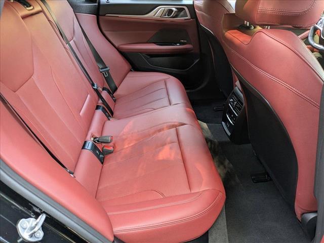 Photo of 2025 Black Sapphire Metallic BMW i4 Gran Coupe