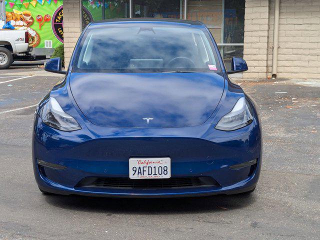 Photo of 2022 Deep Blue Metallic Tesla Model Y