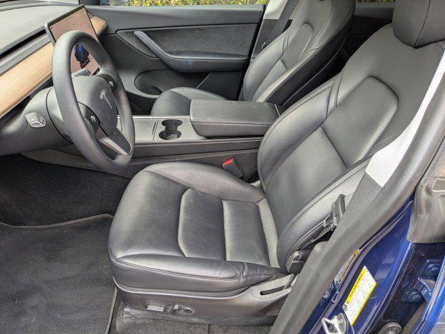 Photo of 2022 Deep Blue Metallic Tesla Model Y