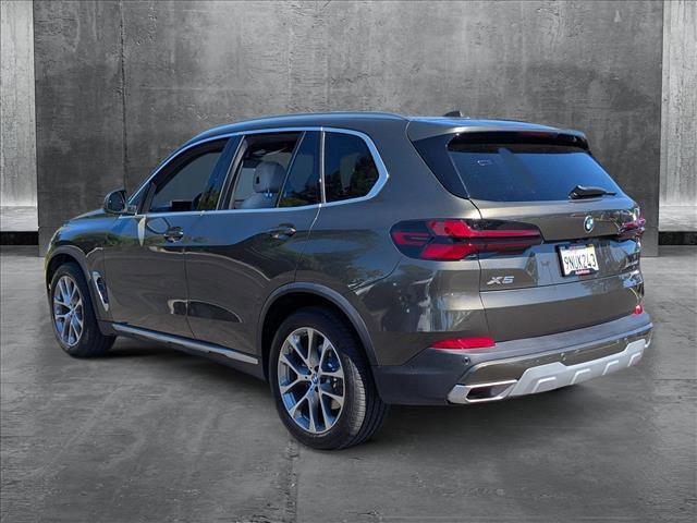 Photo of 2025 Manhattan Green Metallic BMW X5