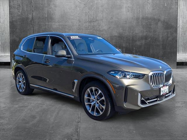 Photo of 2025 Manhattan Green Metallic BMW X5
