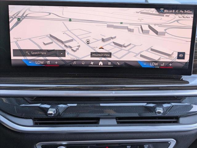 Photo of 2025 Manhattan Green Metallic BMW X5