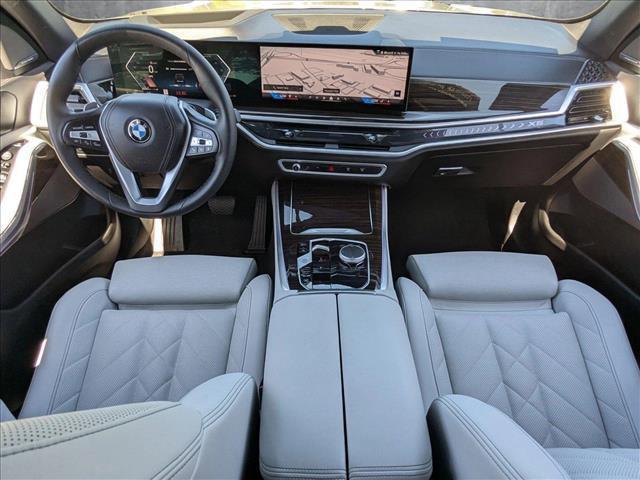 Photo of 2025 Manhattan Green Metallic BMW X5