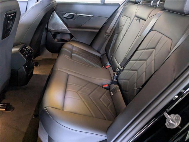 Photo of 2025 Black Sapphire Metallic BMW i5