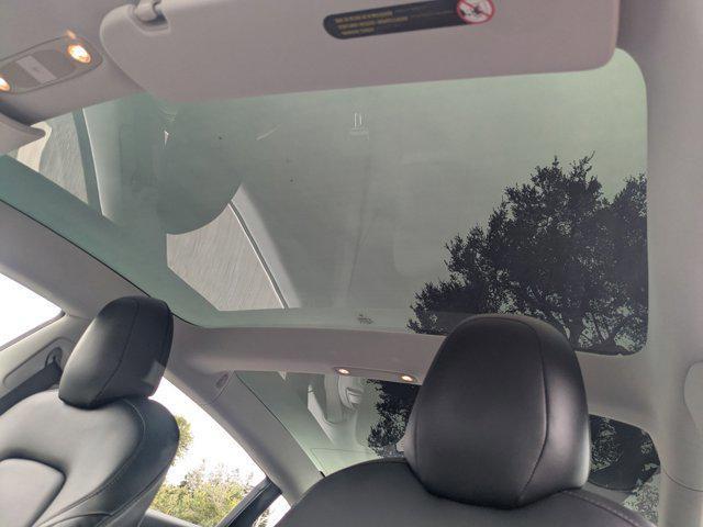 Photo of 2018 Deep Blue Metallic Tesla Model 3