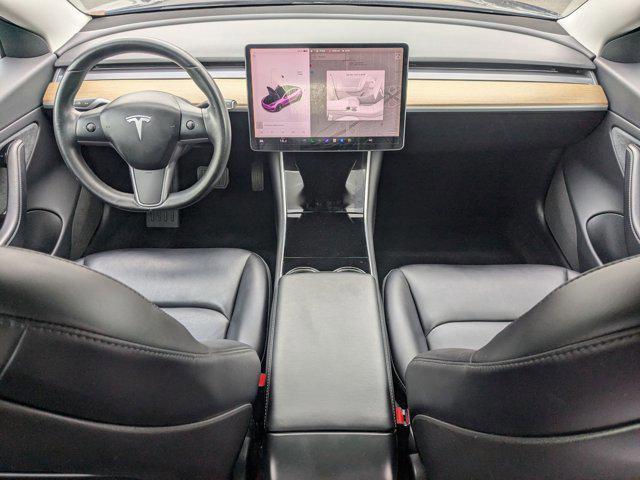 Photo of 2018 Deep Blue Metallic Tesla Model 3