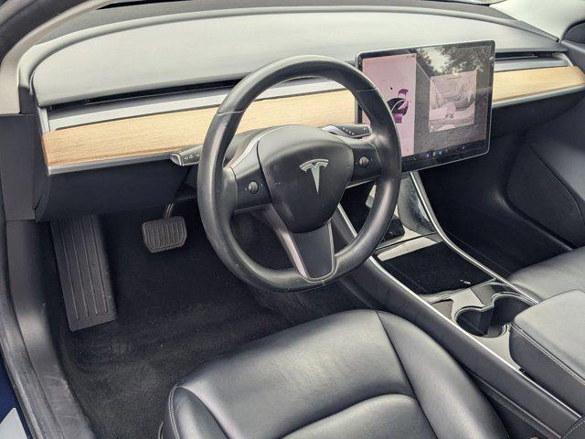 Photo of 2018 Deep Blue Metallic Tesla Model 3