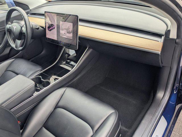 Photo of 2018 Deep Blue Metallic Tesla Model 3
