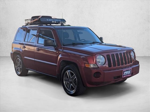 Photo of 2010 Inferno Red Crystal Pearl Jeep Patriot