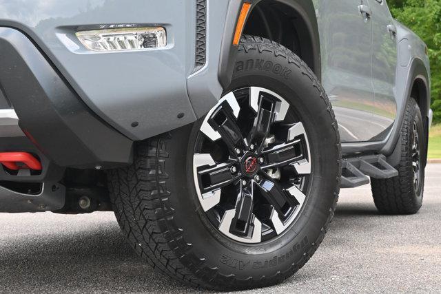 Photo of 2023 Boulder Gray Pearl Nissan Frontier