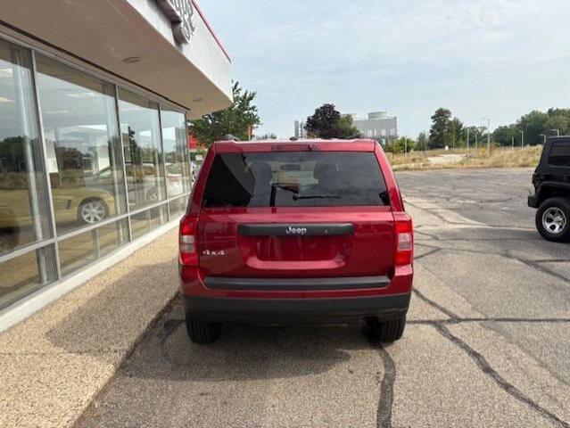 Photo of 2015 Deep Cherry Red Crystal Pearlcoat Jeep Patriot