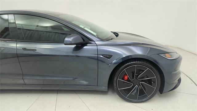 Photo of 2025 Black Tesla Model 3