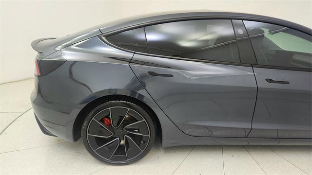 Photo of 2025 Black Tesla Model 3