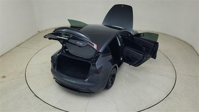 Photo of 2025 Black Tesla Model 3