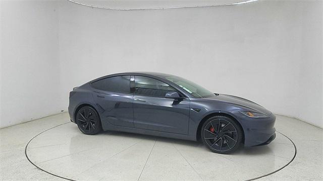 Photo of 2025 Black Tesla Model 3