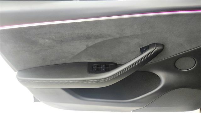 Photo of 2025 Black Tesla Model 3