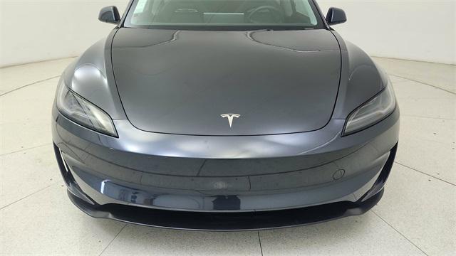 Photo of 2025 Black Tesla Model 3