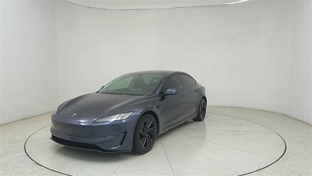 Photo of 2025 Black Tesla Model 3