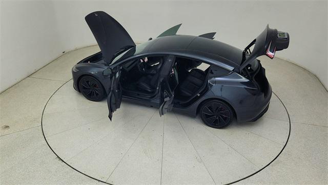 Photo of 2025 Black Tesla Model 3