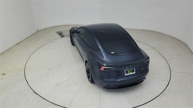 Photo of 2025 Black Tesla Model 3
