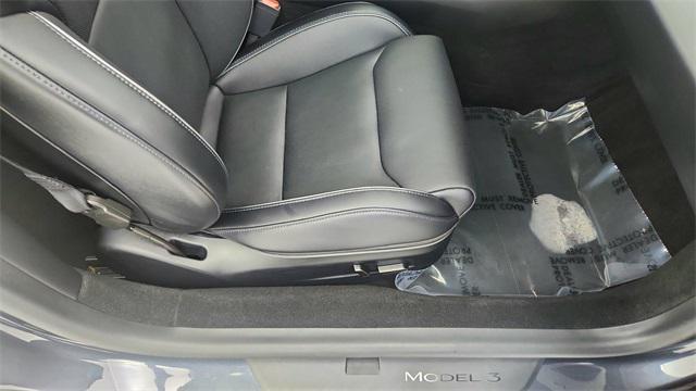 Photo of 2025 Black Tesla Model 3